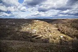 Castle Hill (in the photo illuminated by sun), around which the ancient town of Stina was located