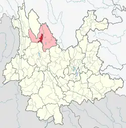 Location of Gucheng District (red) and Lijiang City (pink) in Yunnan