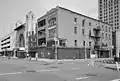 100 block of Monroe from Farmer Street with the Royal Theater (originally the Star) at 100-102 Monroe in the foreground, 1989.
