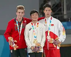 Still rings victory ceremony (from left to right): Félix Dolci (Silver), Takeru Kitazono (Gold), Yin Dehang (Bronze)