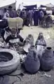 A market with waterjars, 1997