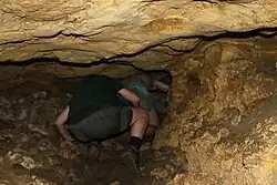People passing through the interior of the cavity
