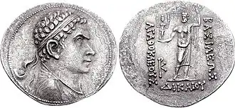 Silver coin of Agathocles. The obverse shows the king's portrait wearing a diadem. The reverse shows standing Zeus holding goddess Hecate and sceptre. Greek legend reads: ΒΑΣΙΛΕΩΣ ΔIKAIOY ΑΓΑΘΟΚΛΕΟΥΣ, Basileōs Dikaiou Agathokleous, "of King Agathocles the Just".