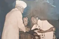 K. Appukuttan Achary receiving the National Award from President Dr. Radhakrishnan for his ivory carving "Chola Queen" in 1965