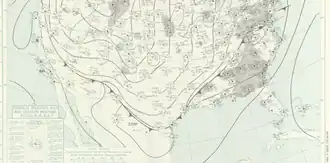Black isolines, barbs, and isothermal features depicting pressure, wind, and temperature gradients