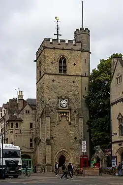 Square medieval tower at a crossroads