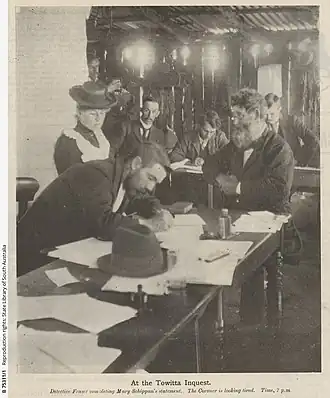 Black and white newspaper photo of people at an inquest in 1902