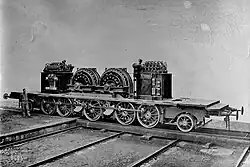 The bare chassis, without body but with two motors and two sets of electric control gear.