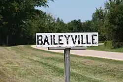 Sign showing Baileyville, Illinois.