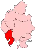 A small constituency in the south of the county. It includes a long but very thin island to the west of the mainland part of the constituency.