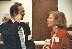 St. Armand, left, talking with Jennifer B. Lee