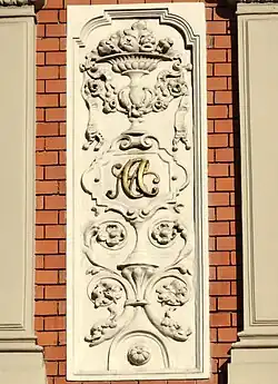 Ornament with "MC" initials