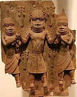 Room 25 - Detail of one of the Benin brass plaques in the museum, Nigeria, 1500-1600 AD