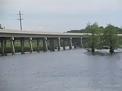 Concrete bridge carries traffic on Louisiana State Highway 9 over Black Lake near Creston.