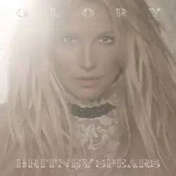 The album's original cover features a close-up image of Spears with a bright light in the background. The album title is written on top of the image, while Spears's name is written below her image.