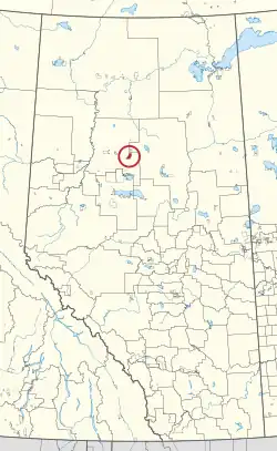 A map of the province of Alberta showing 80 counties and 145 small Indian reserves. One is highlighted with a red circle.