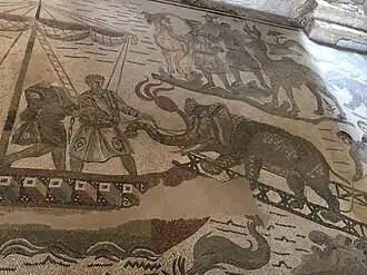 Elephant being loaded onto ship