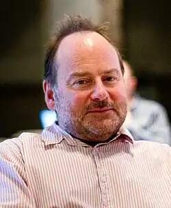 A man in a white shirt