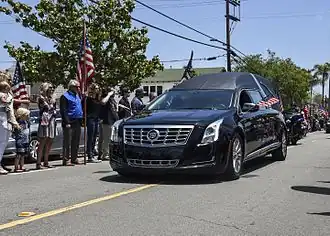 Keating's funeral procession travels along Sixth Avenue in Coronado, California, on its way to Fort Rosecrans National Cemetery.