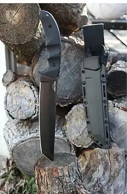 Cold Steel Tanto design knife with Black Hills Ammunition Company cartouche. Carbon steel with high chromium content +vanadium. Blade Length: 7+1⁄2"; Length overall: 12+3⁄4"; Steel: U.S. CPM 3-V High Carbon; Weight: 13 oz; Blade Thickness: 0.2"; Handle: 4+3⁄4" long G-10 Sheath: Secure-Ex®