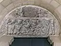 Tympanum of the portal to the cloister. Above, Chi Rho, below Epiphany
