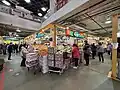 Main floor has traditional Chinese open market