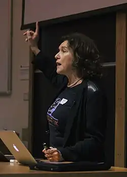 Daniela Bortoletto speaking in a lecture theatre