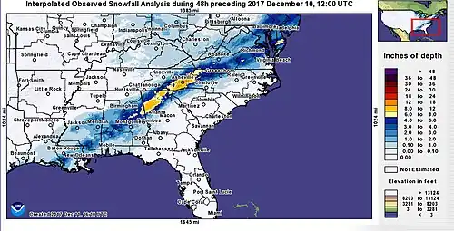 A map showing how much snowfall in inches occurred across the United States as a result of the winter storm, the map of which shows a narrow corridor of higher snowfall accumulations across the Southeastern United States, especially across eastern Alabama, northwestern Georgia, and western North Carolina.