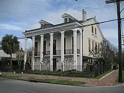 The Dufour Plassan House with its "cornstalk fence" is a neighborhood landmark