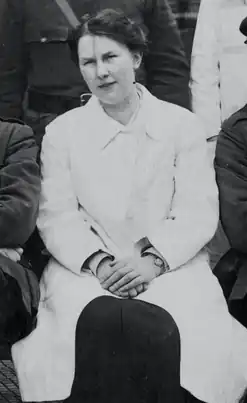 Black and white photograph of Dulcie Mary Pillers, seated front row, next to Ernest William Hey Groves (not shown). Taken from a group photograph of the medical staff at the hospital near the end of World War I.