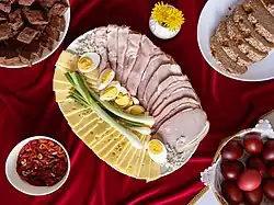 Easter breakfast made of ham, Easter eggs, cheese, cakes is common cuisine in the Balkan
