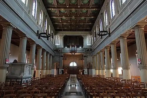 The nave facing the tribune, with the pulpit on the left