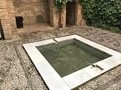 The water basin in the relaxation room at the entrance of the complex