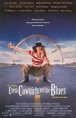 The poster features Uma Thurman squatting along a highway with her thumb out hitch-hiking