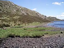 Far eastern end of Uidh Fhearna looking eastback down the side of Loch Veyatie The 'shore' of the loch here was fairly flat before narrowing down towards Uidh Fhearna