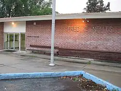 Entrance where persons are searched and controlled when entering or leaving facility