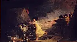 Soldiers firing upon a woman with a child in her arms and a group of dead soldiers lying on the ground.