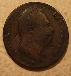 Copper coin with a man's head
