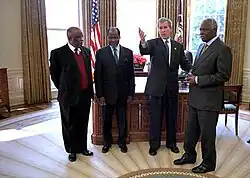 Image 30Festus Mogae alongside foreign presidents Joaquim Chissano, George W. Bush, and José Eduardo dos Santos in 2002 (from History of Botswana)
