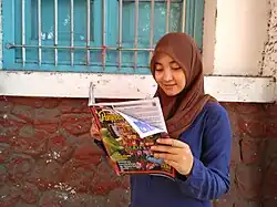 Girl reading Panjebar Semangat