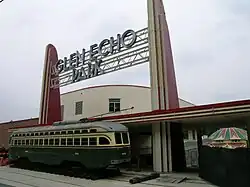 A PCC streetcar at the renovated Streamline Moderne entrance to Glen Echo Park (June 2006)