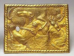 Gold belt buckle inscribed with Chinese characters found in Xigoupan M2 (4th-3rd century BC)
