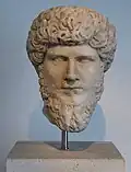 Head of Lucius Verus, who reigned from 161 to 169 together with his adopted brother Marcus[39]