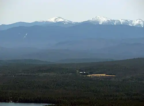 The Adirondack High Peaks from St. Regis Mountain. Mount Marcy is just left of center, Algonquin Peak is to the right