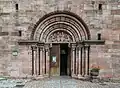 Romanesque main portal (1230s)
