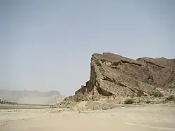 Rock formation and dunes