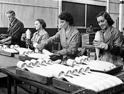 Image 25Workers inspecting practice bombs at a factory in South Australia during 1943 (from Australia in World War II)