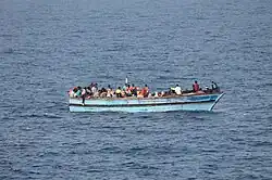 A boat with migrants, off the Libyan coast.