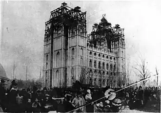 Laying capstone of S.L. Temple