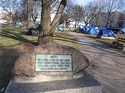 The northwestern entrance to Lincoln Park, with the Occupy Maine encampment in the background.